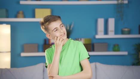 positive boy thinks about his dreams and becomes happy.