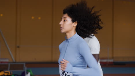 young people running indoors