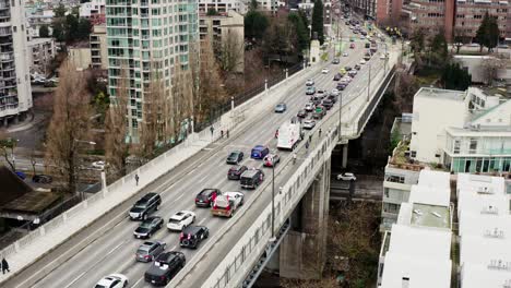 convoy of protesters in heavy traffic at burrard bridge during truckers convoy protest 2022 in vancouver