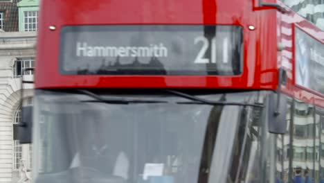 bus driving across westminster bridge