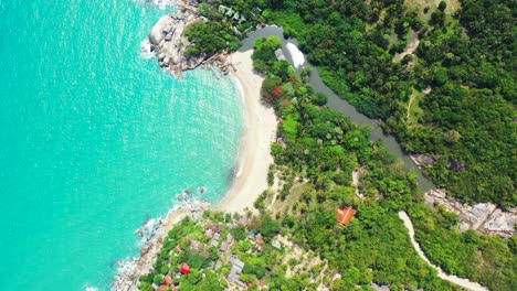 National-reserve,-Haad-Than-Sadet-Beach-with-white-sand-colorful-houses-palms-and-crystal-clear-turquoise-sea