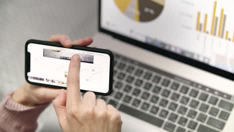 foto de una mujer con gráficos de negocios en un teléfono móvil. trabajo de negocios