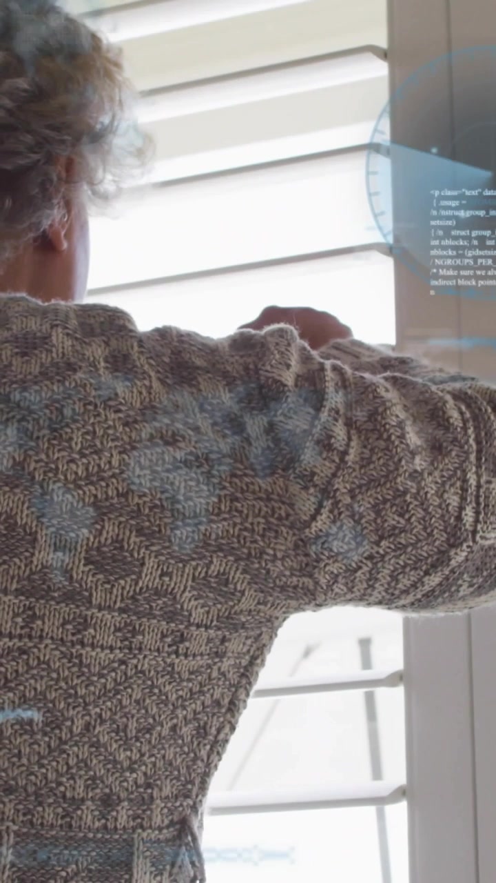 Vertical video: Senior woman touching slat tilting blinds opening view with blue HUD guiding tech