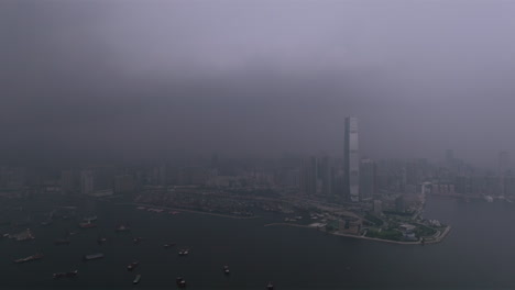 heavy thunderstorm and lighting striking near icc, hong kong