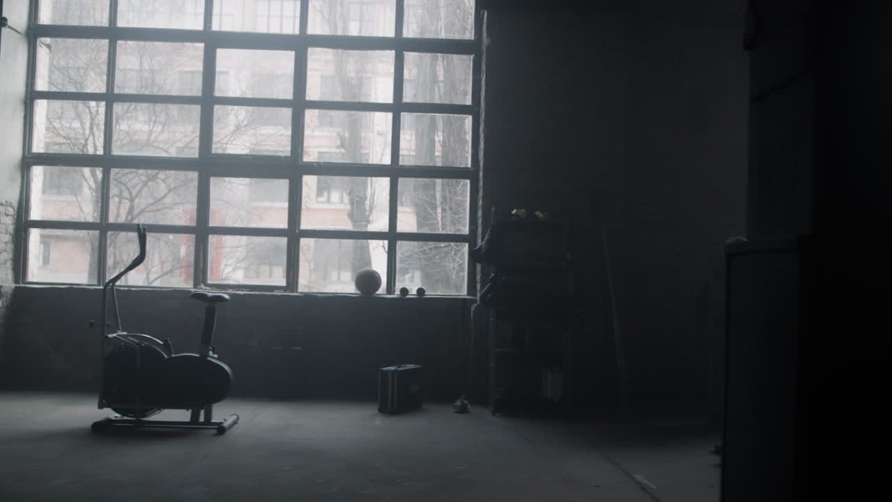Interior of modern gym with sports equipment. Exercise machines in workout hall