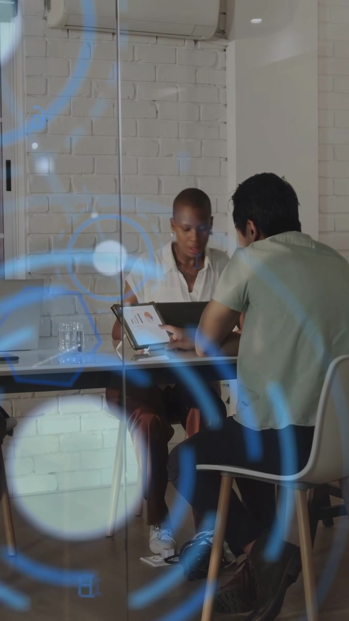 Vertical video: Team checking tablet, tapping screen causing blue AR radar for business planning