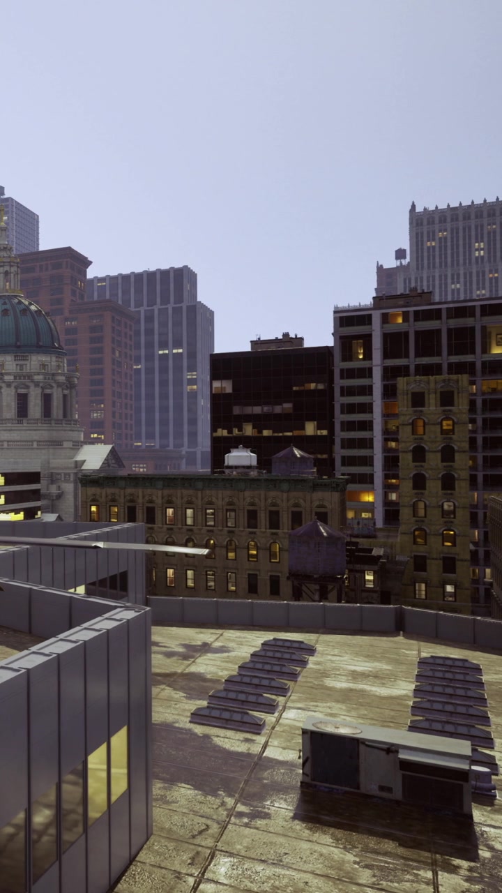 Edifícios se elevam contra o horizonte ao anoitecer.