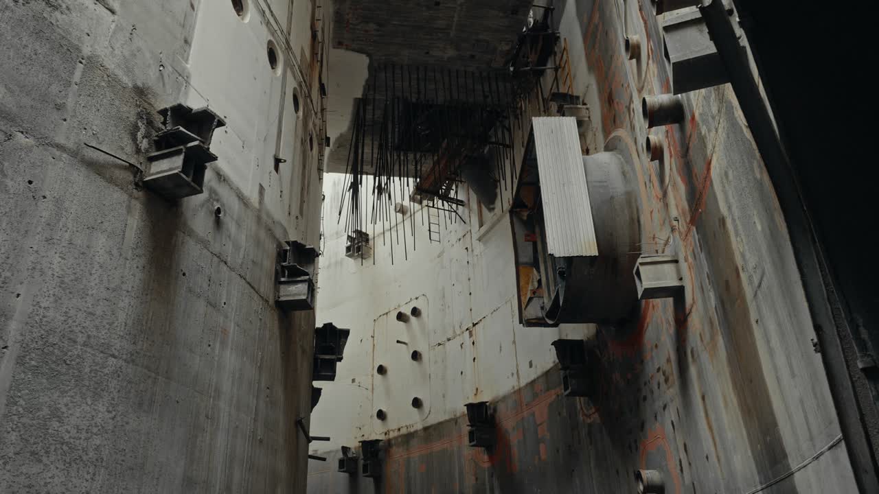 Looking Up Inside a Large Abandoned Concrete Industrial Structure