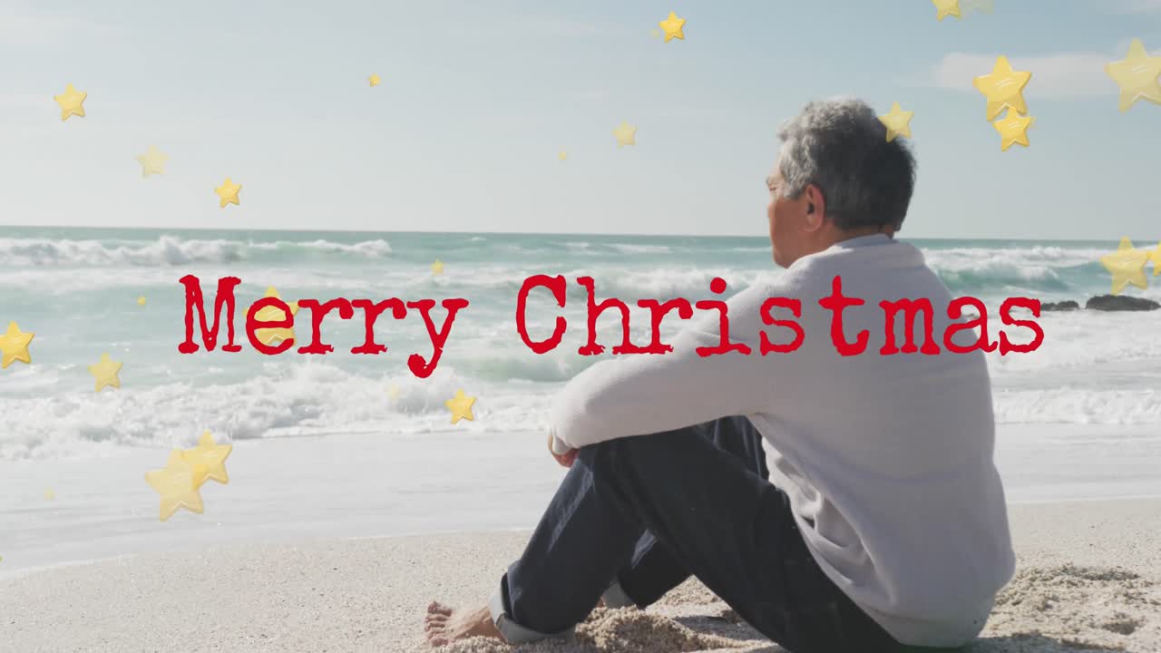 해변에서 고령 한 인종 남성 위에 메리 크리스마스 텍스트의 애니메이션