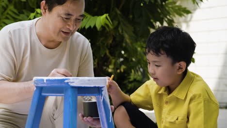 Asian-man-and-boy-in-the-backyard