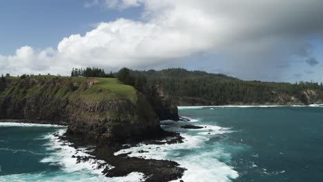 4k aerial - norfolk island, australia slow push in towards coast line dji inspire 2