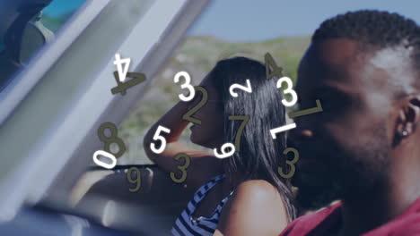 animation of numbers floating over people in convertible car, enjoying ride