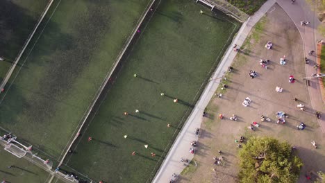 people playing on small soccer football training fields