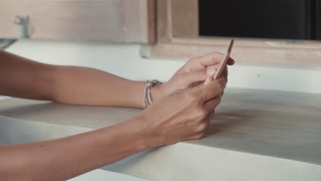 brown-haired woman using tablet computer