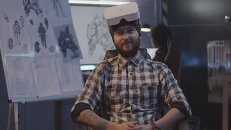 man wearing vr headset in design studio