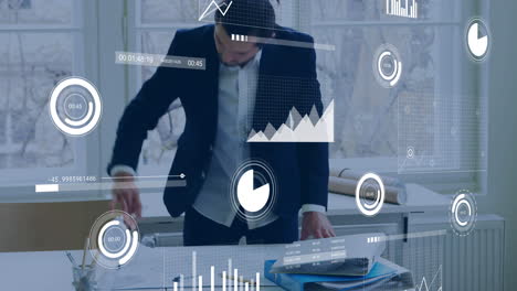 animation of financial data processing over caucasian businessman in office