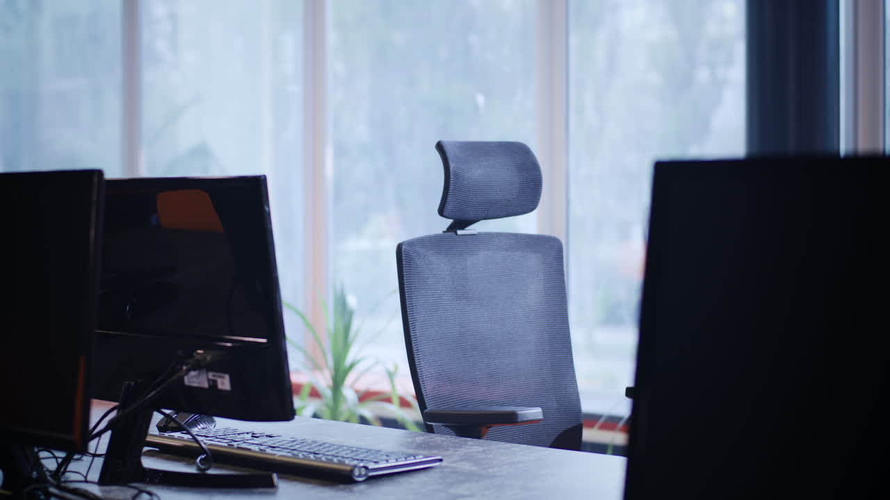 Empty Office Workspace by a Window