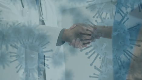 células de covid-19 moviéndose contra la sección media médico y enfermera estrechándose la mano
