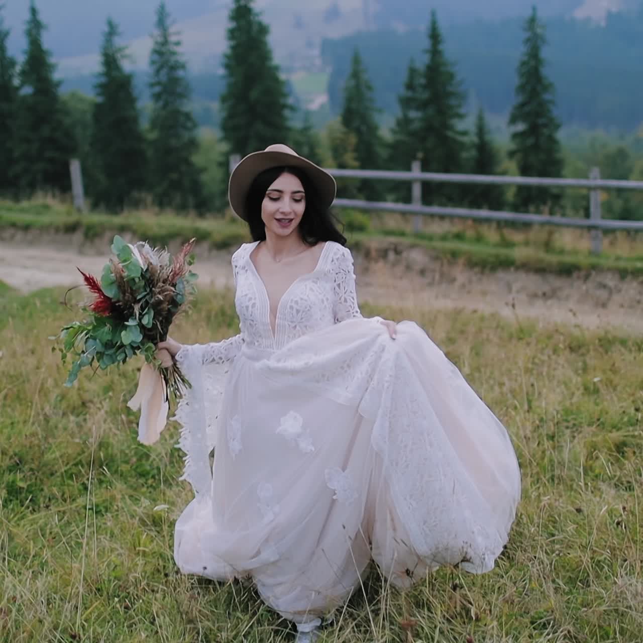 Beautiful bride against mountains