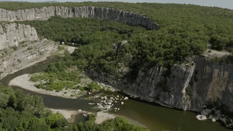 ardeche river wooded valley pradons france cliff face rocks natural beautiful summer aerial view