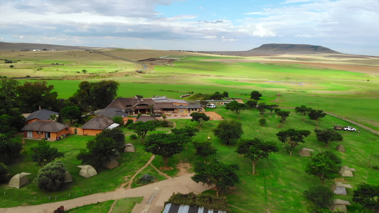 Aerial view of a resort in a green landscape