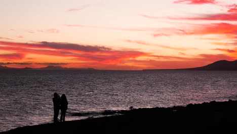 sunset couple on the beach