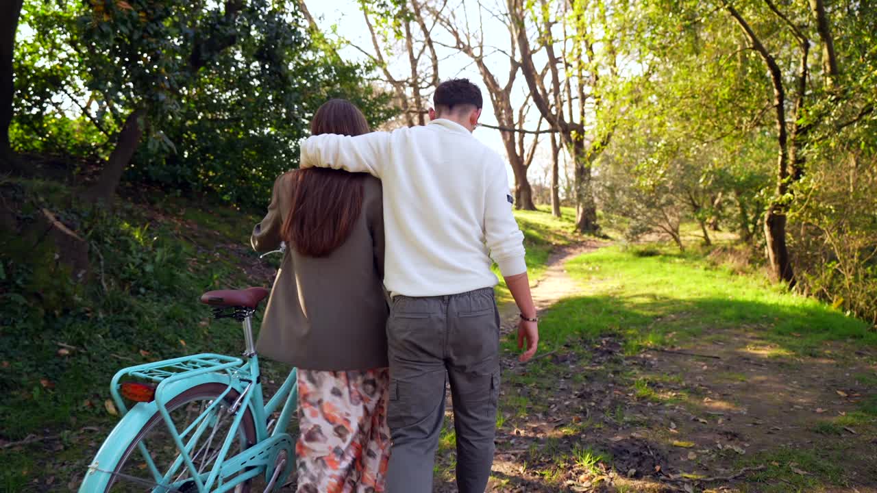 Couple Enjoying a Bike Ride in the Park