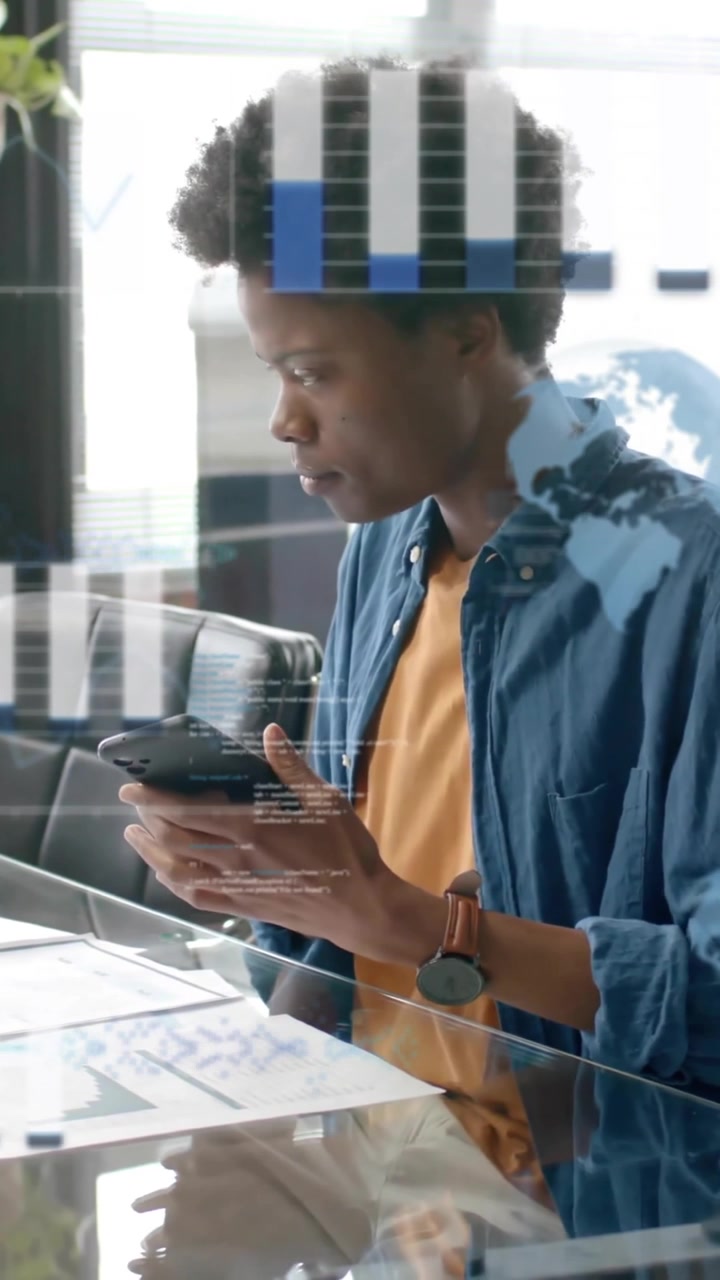 Animation of data processing over african american businessman in office