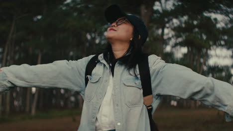 woman enjoying nature in a forest