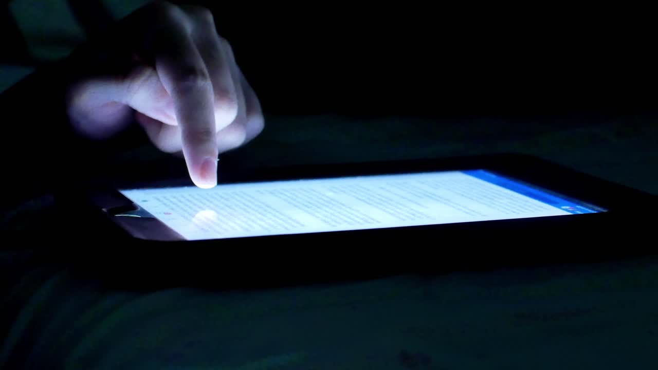 POV to a smartphone-tablet while being touched, young woman using mobile phone-tablet