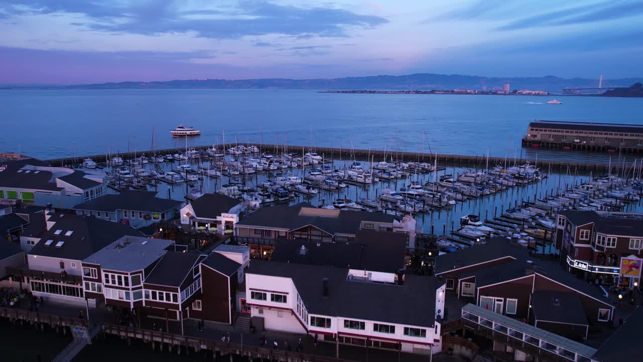 San Francisco USA, Drone Shot of Marina Behind Pier 39 Buildings in Twilight