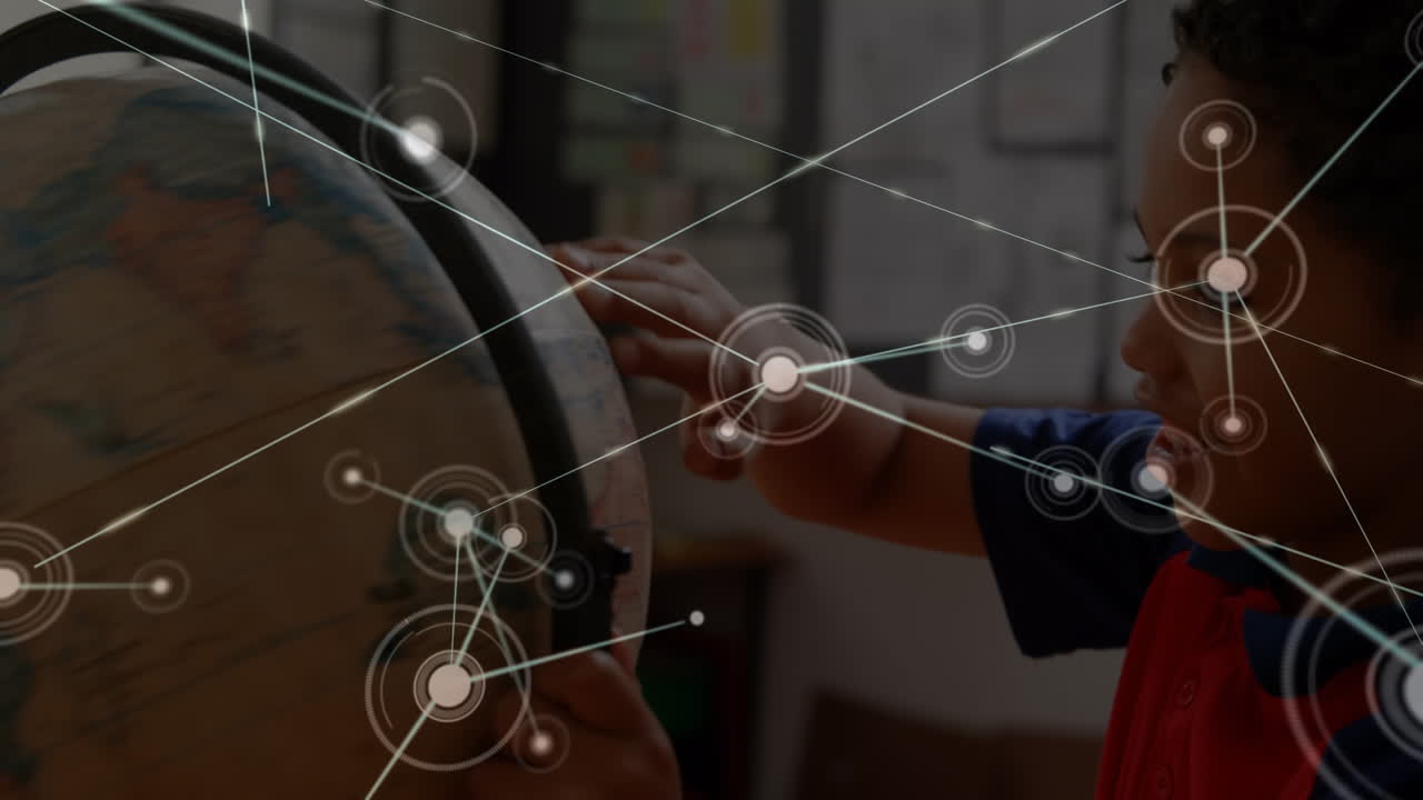 Animation of network of connections over biracial schoolboy with globe