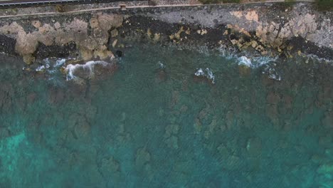 Drone-shot-of-a-rocky-shoreline-beach-in-Hawaii