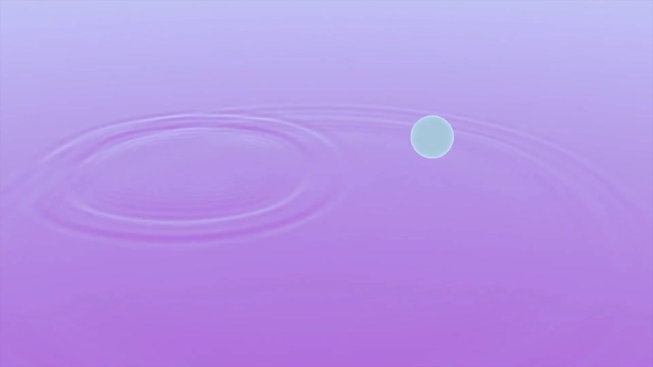 A water drop falls into a still body of purple water