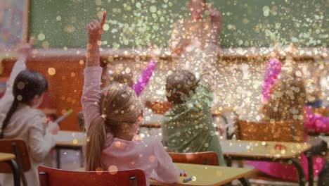 Animation-of-light-spots-over-diverse-schoolchildren-raising-hands-in-classroom