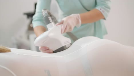 vacuum-roller body massage in the clinic of modern cosmetology