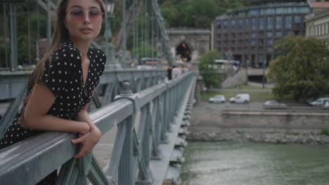 young woman on a bridge in budapest