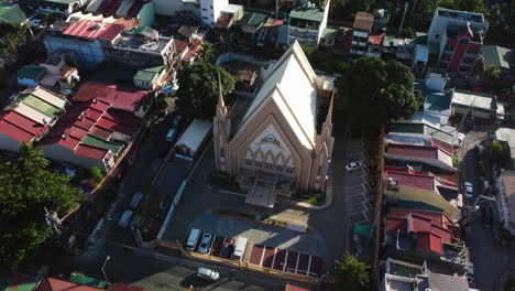 aerial view around the iglesia ni cristo - lokal ng sacramento, in sunny manila, philippines