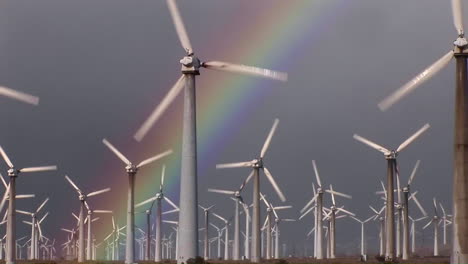 gorgeous rainbows illuminate wind powered generators spinning 3