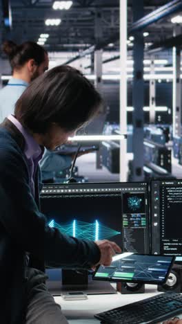 vertical video multiracial technicians in diverse data center review ai diagnostics