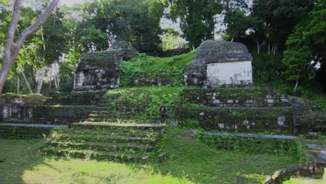 Old-Mayan-Ruin-in-the-Jungle-in-Guatemala,-Nakum-archeological-site,-rotted-Pyramid