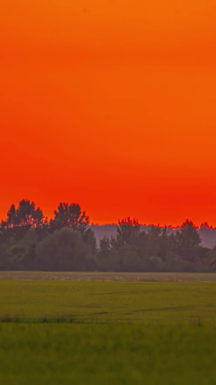 Close Up Of Sunset, Time Lapse Over A Countryside Landscape - Vertical Shot