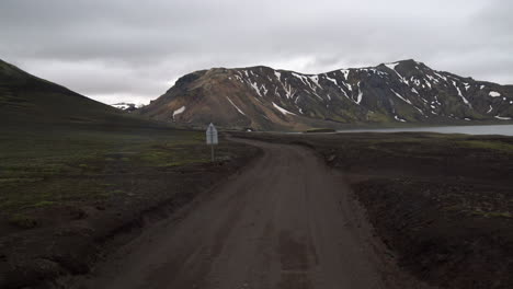 Off-road-car-vehicle-drive-on-dirt-road-to-Landmanalaugar-on-highlands-Iceland.