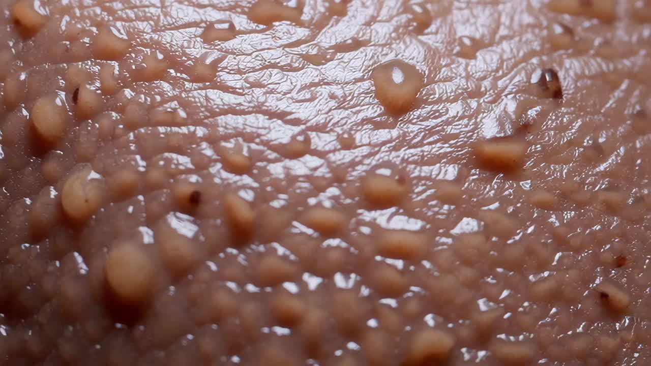 Close-up of Skin with Sweat or Water Droplets