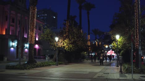 cityscape of street decorated with the christmas light