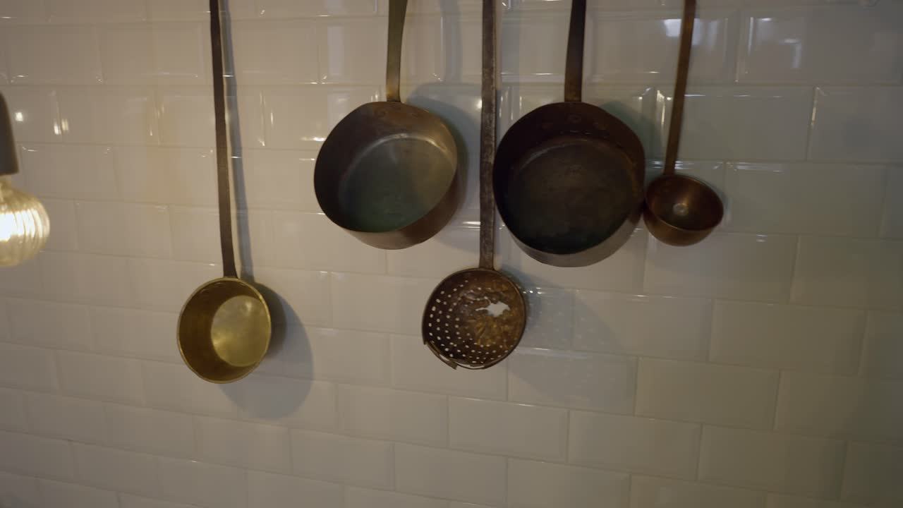 Vintage Kitchen Decor with Hanging Pots and Pans