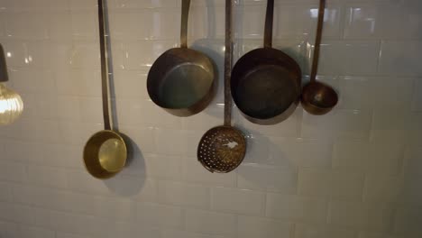 vintage kitchen decor with hanging pots and pans