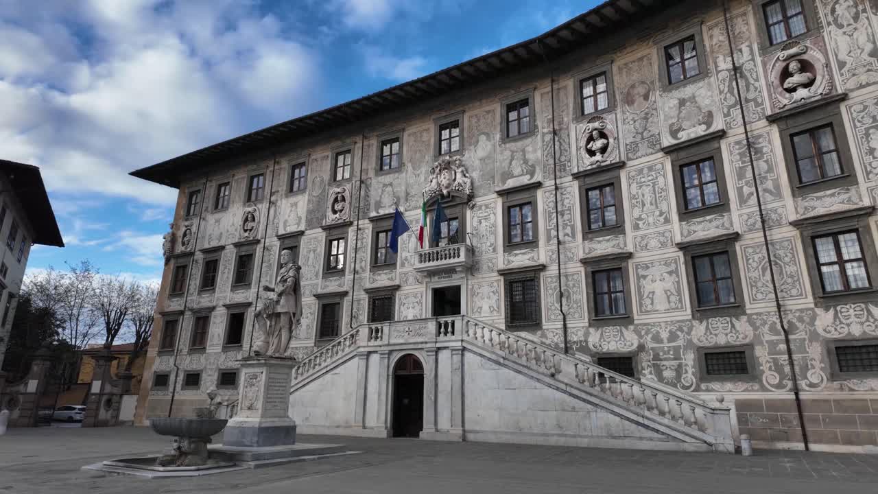 Palace Palazzo della Carovana in Pisa, Italy, beautiful ornate building facade