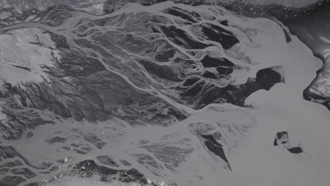 aerial view of gangapurna lake glacier in manang nepal annapurna region revealing global warming impact, river flow, and snowmelt