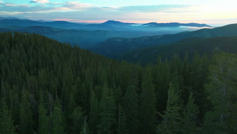 Cinematic-aerial-drone-morning-sunrise-epic-fog-lift-Denver-Mount-Evans-14er-Chicago-lakes-front-range-foothills-Rocky-Mountains-Idaho-Springs-Evergreen-Squaw-pass-Echo-Mountain-lake-i70-forward-pan